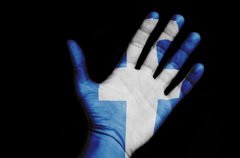 Ruka s logem sociální síti Facebook. Ilustrační foto Ruka s logem sociální síti Facebook. Ilustrační foto - 42TČen
